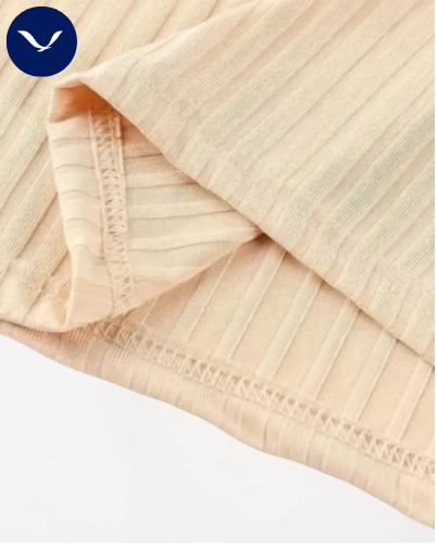 Polo côtelé à manches courtes et demi-zip