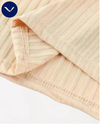 Polo côtelé à manches courtes et demi-zip